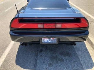 Illustration for article titled Why buy a C8 when you could buy this old, high-mileage, manual, mid-engined Honda for less instead?